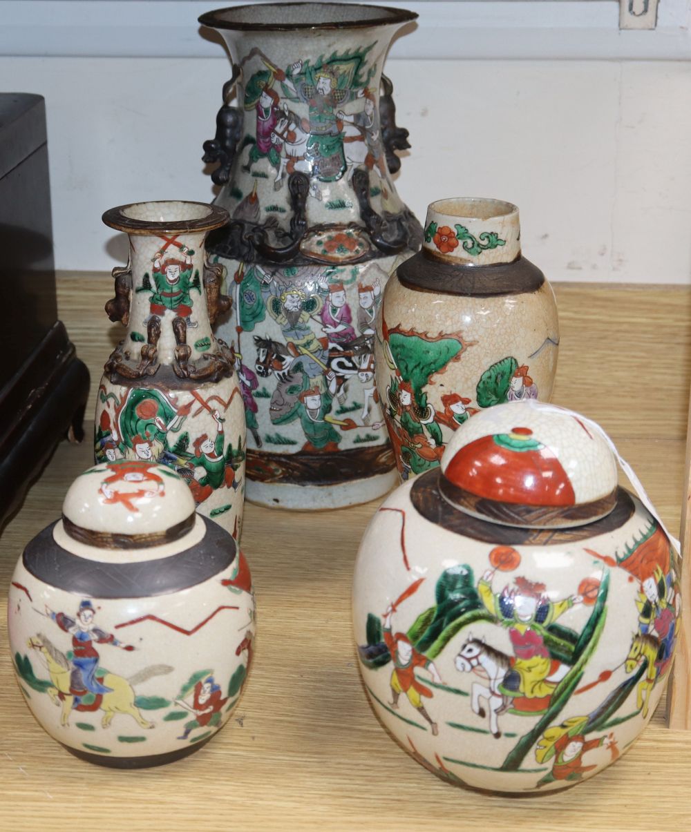 A large Chinese crackleware vase, two smaller vases and two lidded jars, tallest 35cm
